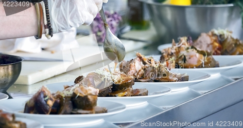 Image of Preparing meat on the table