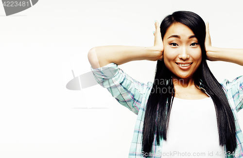 Image of young pretty asian woman posing cheerful emotional isolated on white background, lifestyle people concept 