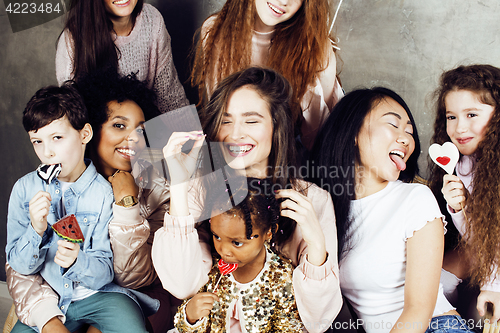 Image of Lifestyle and people concept: young pretty diversity nations woman with different age children celebrating on birth day party together happy smiling, making selfie. African-american, asian and caucasi