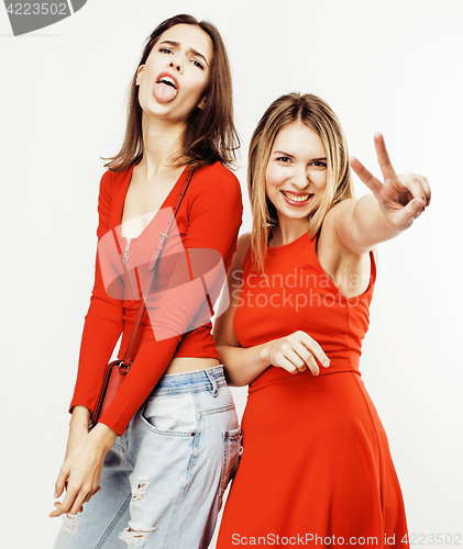 Image of best friends teenage girls together having fun, posing emotional on white background, besties happy smiling, lifestyle people concept close up