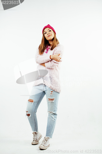 Image of young pretty teenage hipster girl posing emotional happy smiling on white background, lifestyle people concept 