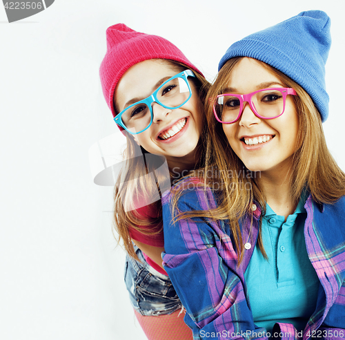 Image of best friends teenage girls together having fun, posing emotional on white background, besties happy smiling, lifestyle people concept close up