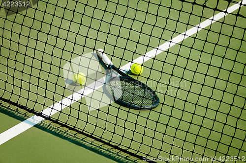 Image of The tennis ball on a tennis court