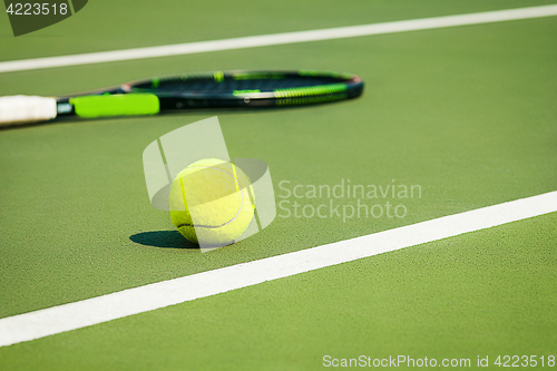 Image of The tennis ball on a tennis court