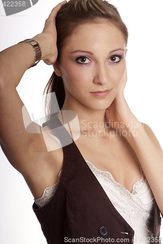 Image of woman hand on head