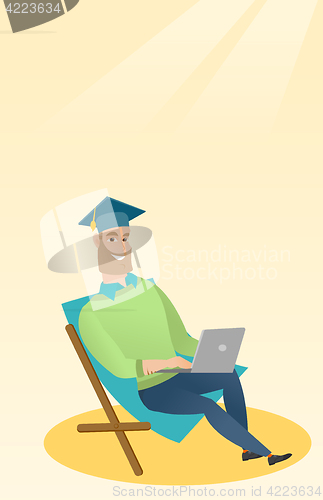 Image of Graduate sitting in chaise lounge with laptop.