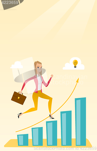 Image of Business woman standing on growth graph.