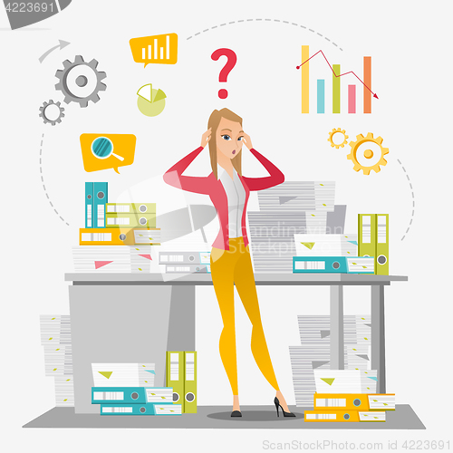 Image of Business woman overloaded with paperwork.