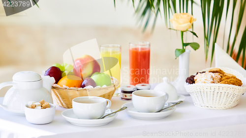 Image of delicious breakfast for two at the luxury hotel.