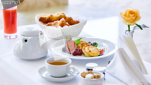 Image of delicious breakfast for two at the luxury hotel.