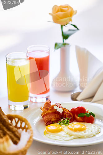 Image of delicious breakfast for two at the luxury hotel.