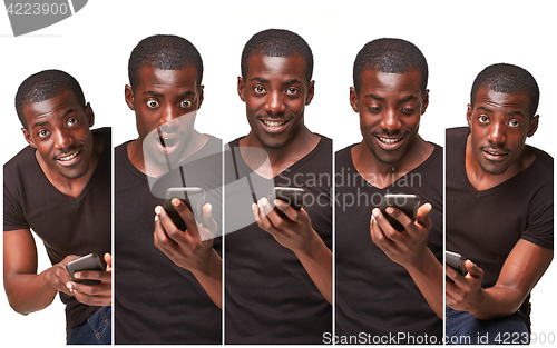 Image of Portrait of smiling african man talking on the phone isolated on a white background