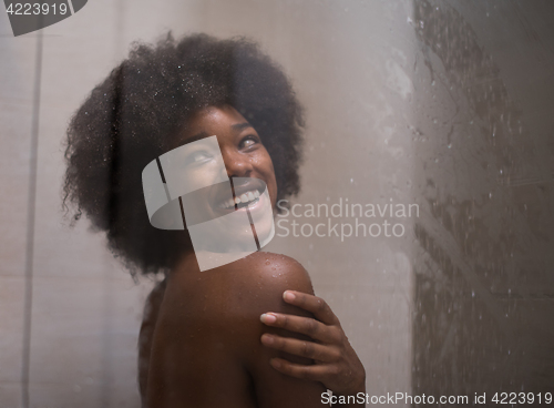 Image of African American woman in the shower