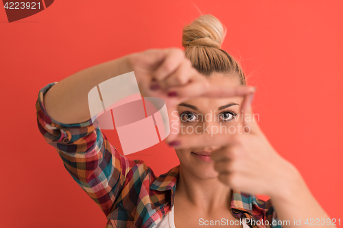 Image of young woman over color background