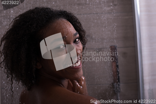 Image of African American woman in the shower