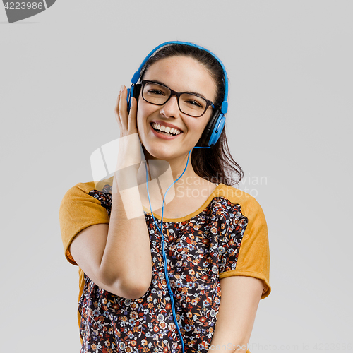 Image of Girl listen music