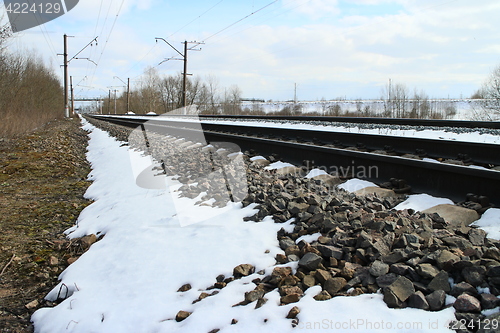 Image of  rails of railway forward at winter