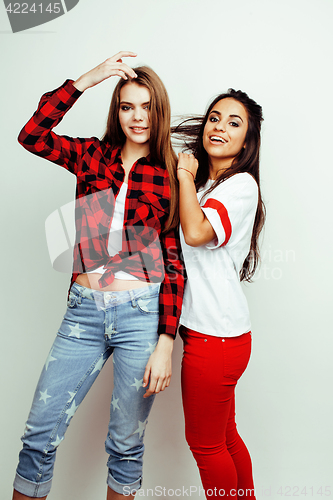 Image of best friends teenage girls together having fun, posing emotional on white background, besties happy smiling, lifestyle people concept, blond and brunette multi nations 