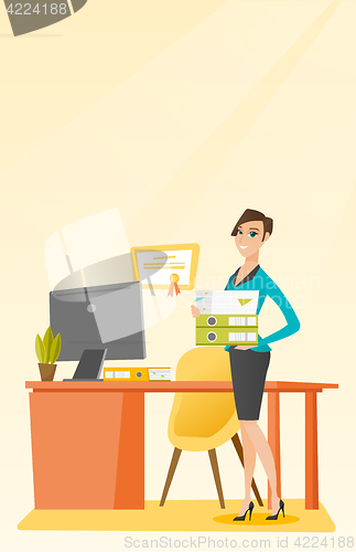 Image of Office worker holding pile of folders.