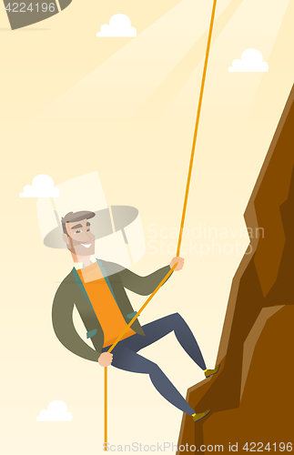 Image of Business woman climbing on the mountain.