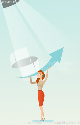 Image of Business woman holding arrow going up.