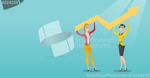 Image of Two business women holding growth graph.