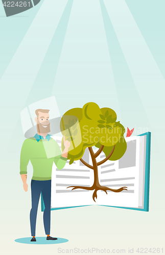 Image of Student pointing at tree of knowledge.