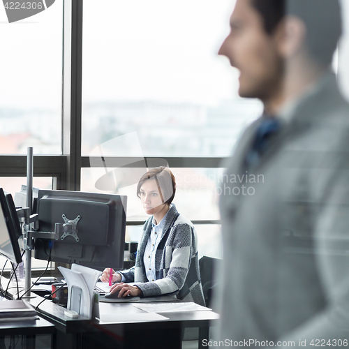 Image of Personal assistant working in corporate office.