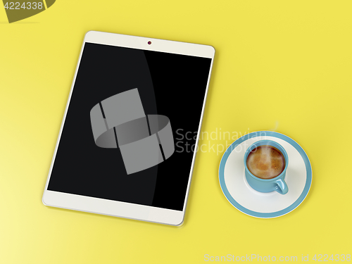 Image of Tablet and coffee cup