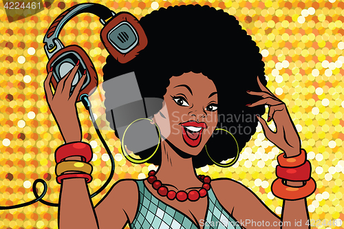Image of African American woman DJ with headphones