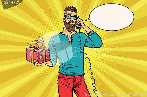 Image of Hipster with a gift of talking on the phone