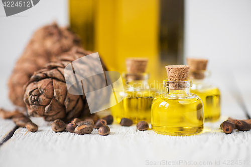 Image of The cedar oil in a glass bottle