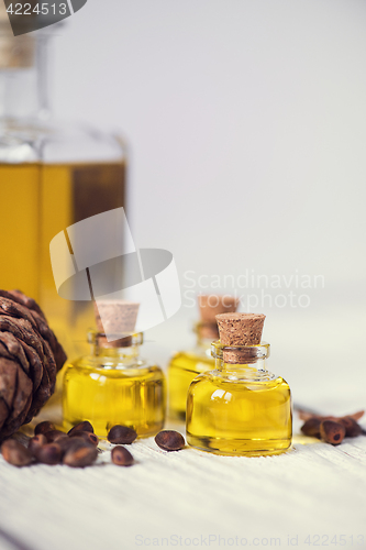 Image of The cedar oil in a glass bottle