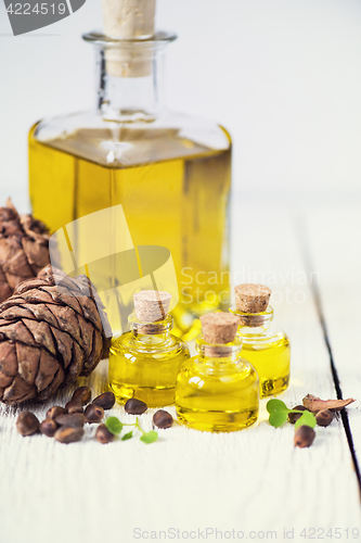 Image of The cedar oil in a glass bottle