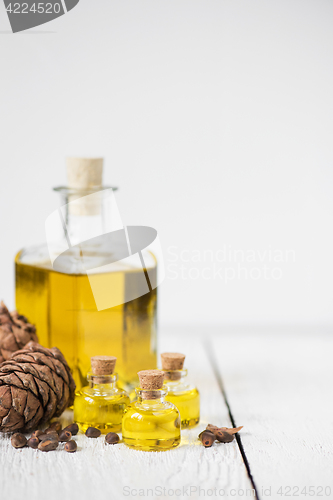 Image of The cedar oil in a glass bottle