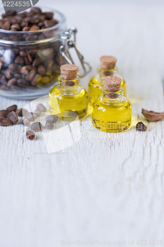 Image of The cedar oil in a glass bottle