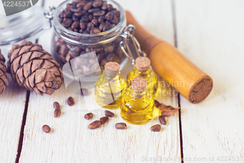 Image of The cedar oil in a glass bottle