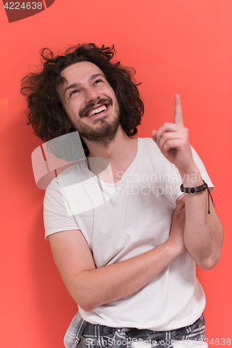 Image of young man with funny hair over color background