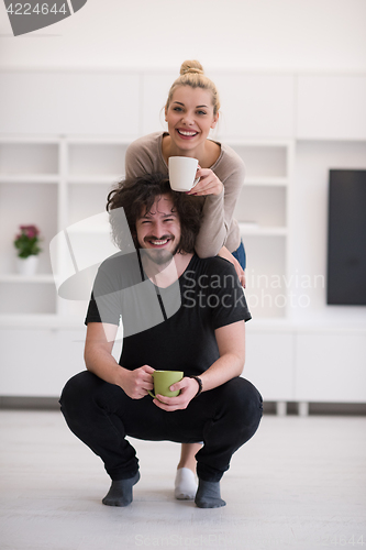 Image of Happy couple in their new home