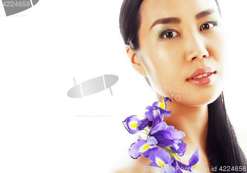 Image of young pretty asian woman with flower orchid close up isolated sp