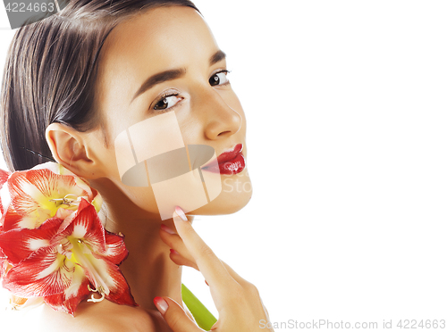 Image of young pretty brunette woman with red flower amaryllis close up i