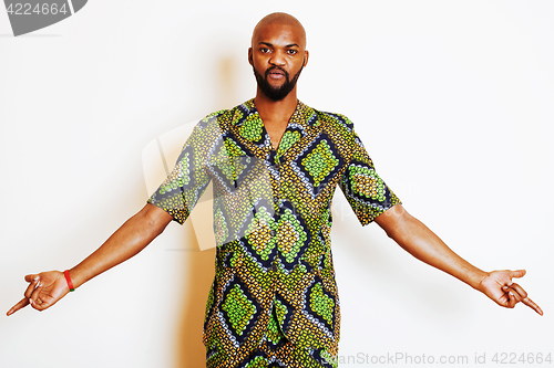 Image of portrait of young handsome african man wearing bright green nati