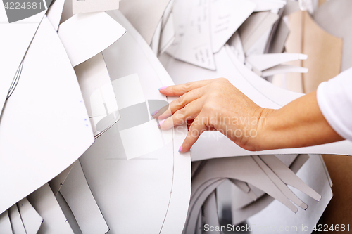 Image of Sewing. Cutting room. A tailor, tailor&#39;s shelf templates 