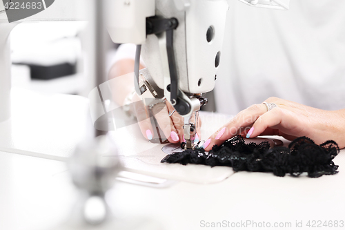 Image of Sewing. Factory, sewing room. Production of apparel.