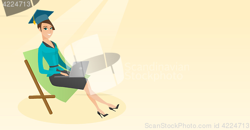 Image of Graduate lying in chaise lounge with laptop.