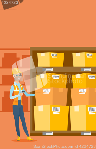 Image of Warehouse worker scanning barcode on box.