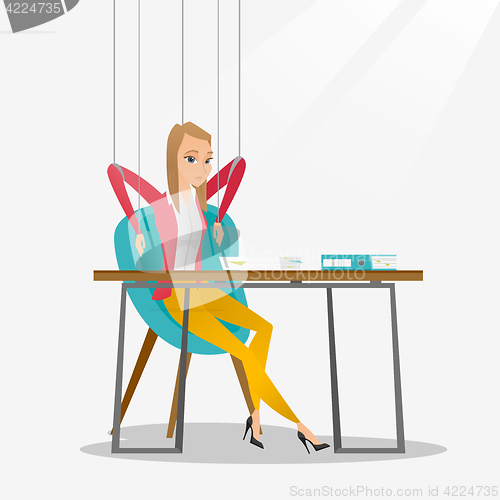 Image of Business woman marionette on ropes working.