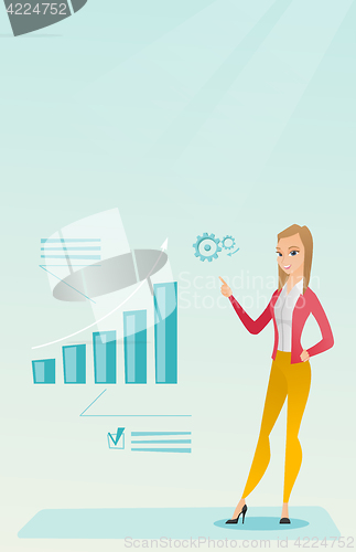 Image of Successful business woman pointing at chart.