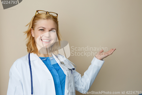 Image of Young doctor on empty background