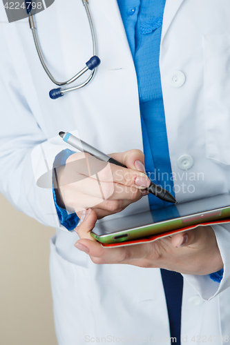 Image of Doctor in coat at work